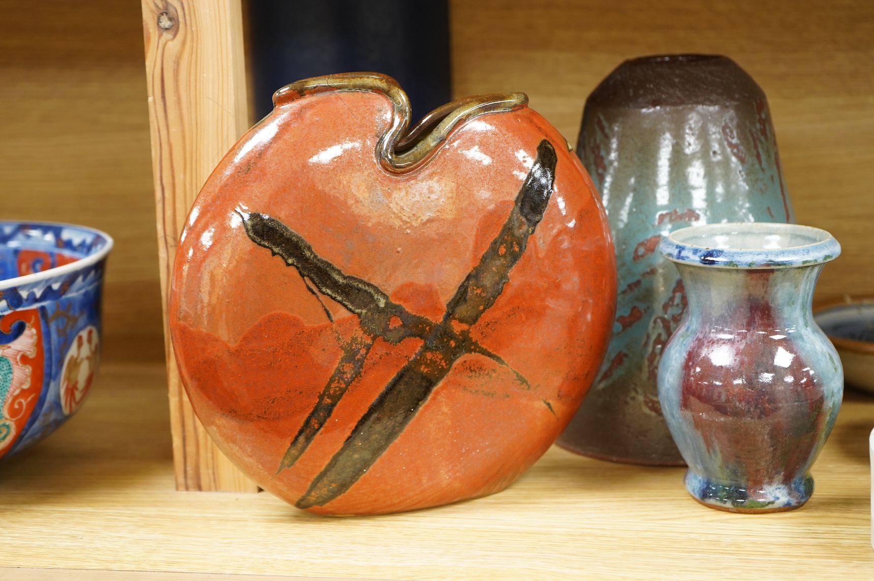A collection of studio pottery to include crystalline glazed works by Stephen R Jones Des, Brighton, vases and a pair of dishes, largest 22cm high